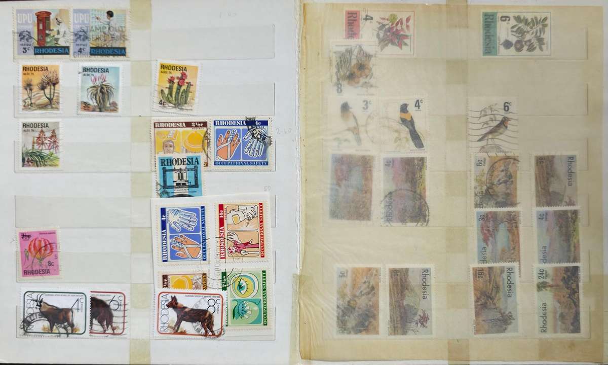 Stock Book: 10 White Pages/ 20 Sides with Used World Mix - Nice Starter