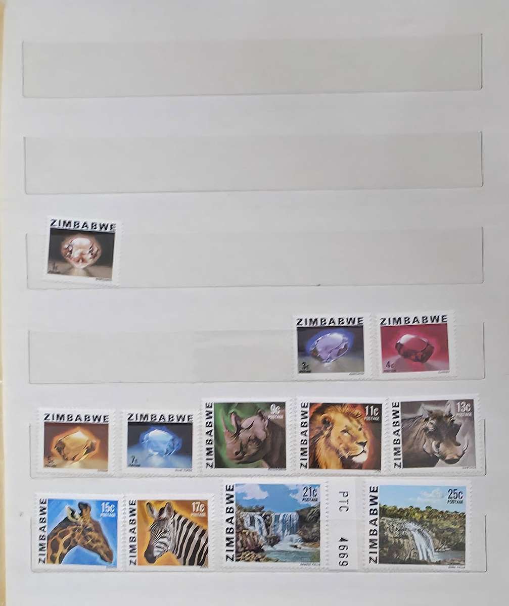 Stock Book: 10 White Pages/ 20 Sides with Used World Mix - Nice Starter