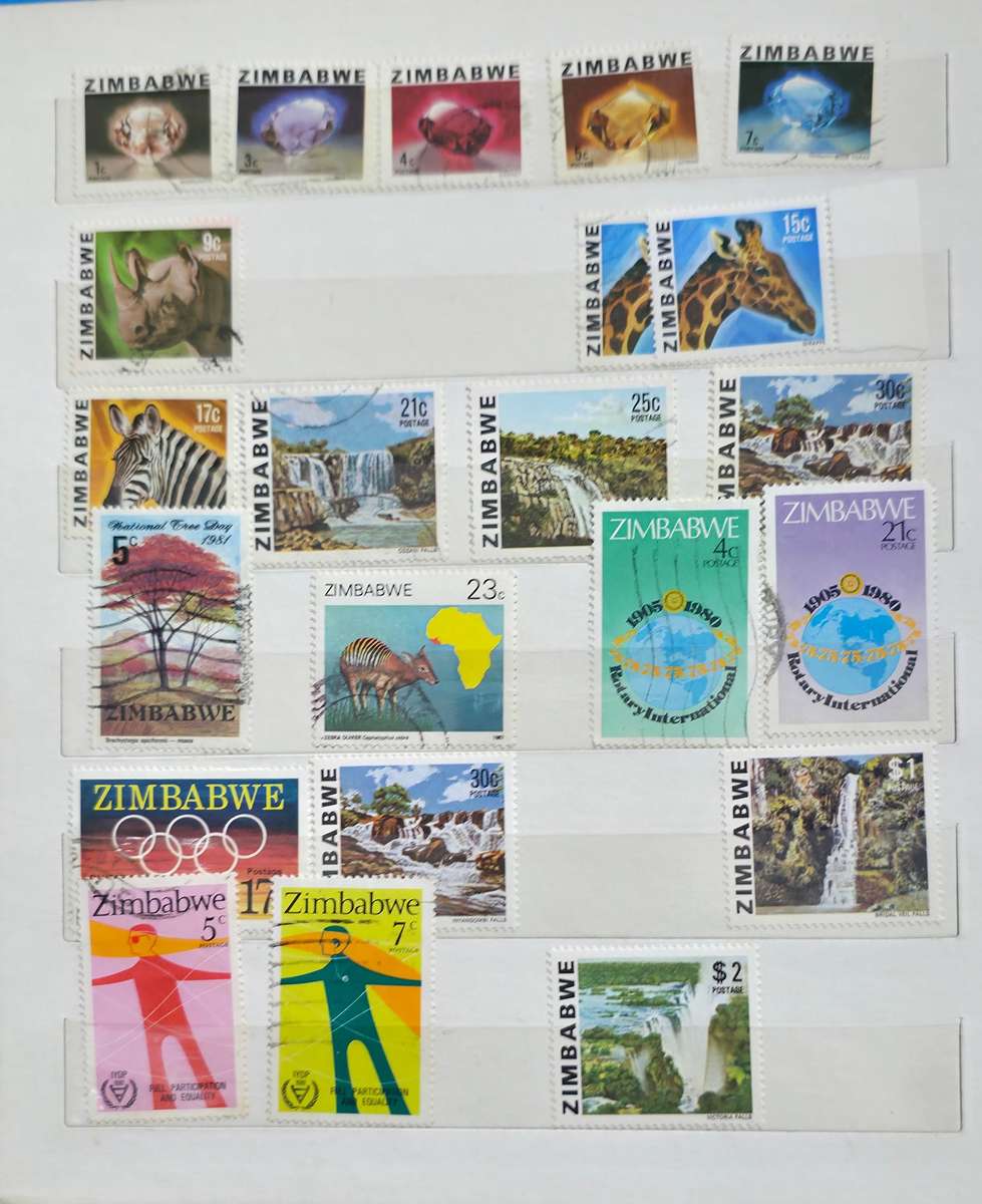 Stock Book: 10 White Pages/ 20 Sides with Used World Mix - Nice Starter