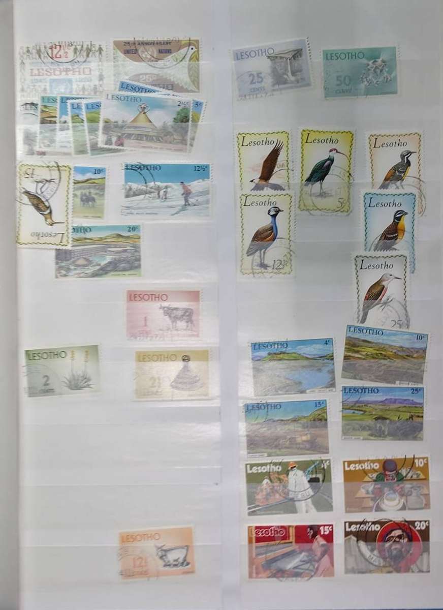 Blue Stock Book with 16/32 Pages containing Lesotho mic Used/Mint. Some pages Scanned.