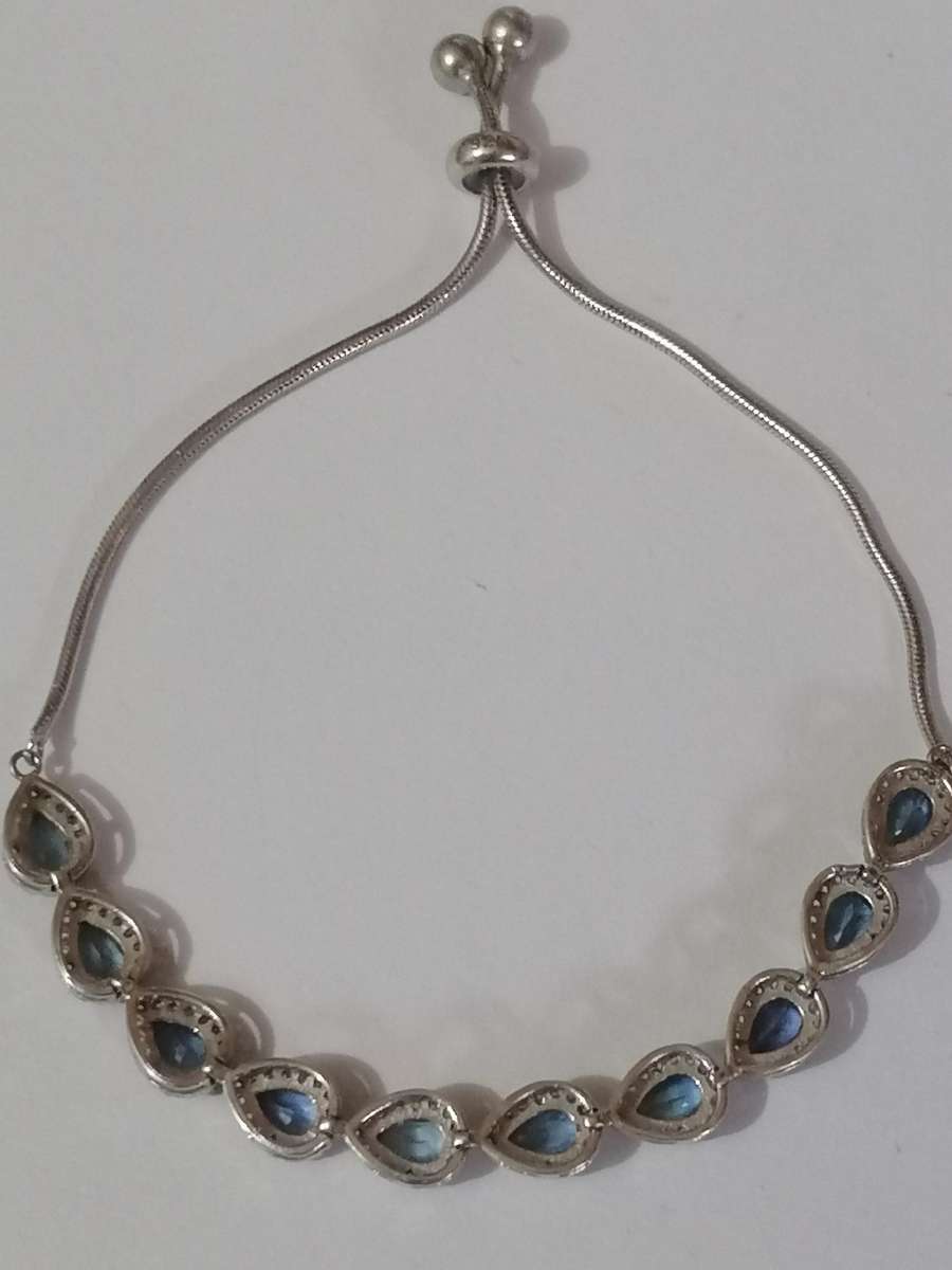 Stylish swivel locking snake chain bracelet, sterling silver with beautiful stones.