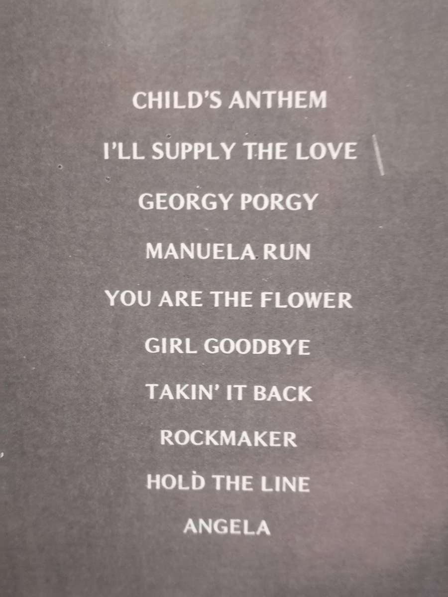 Toto, vinyl very good.