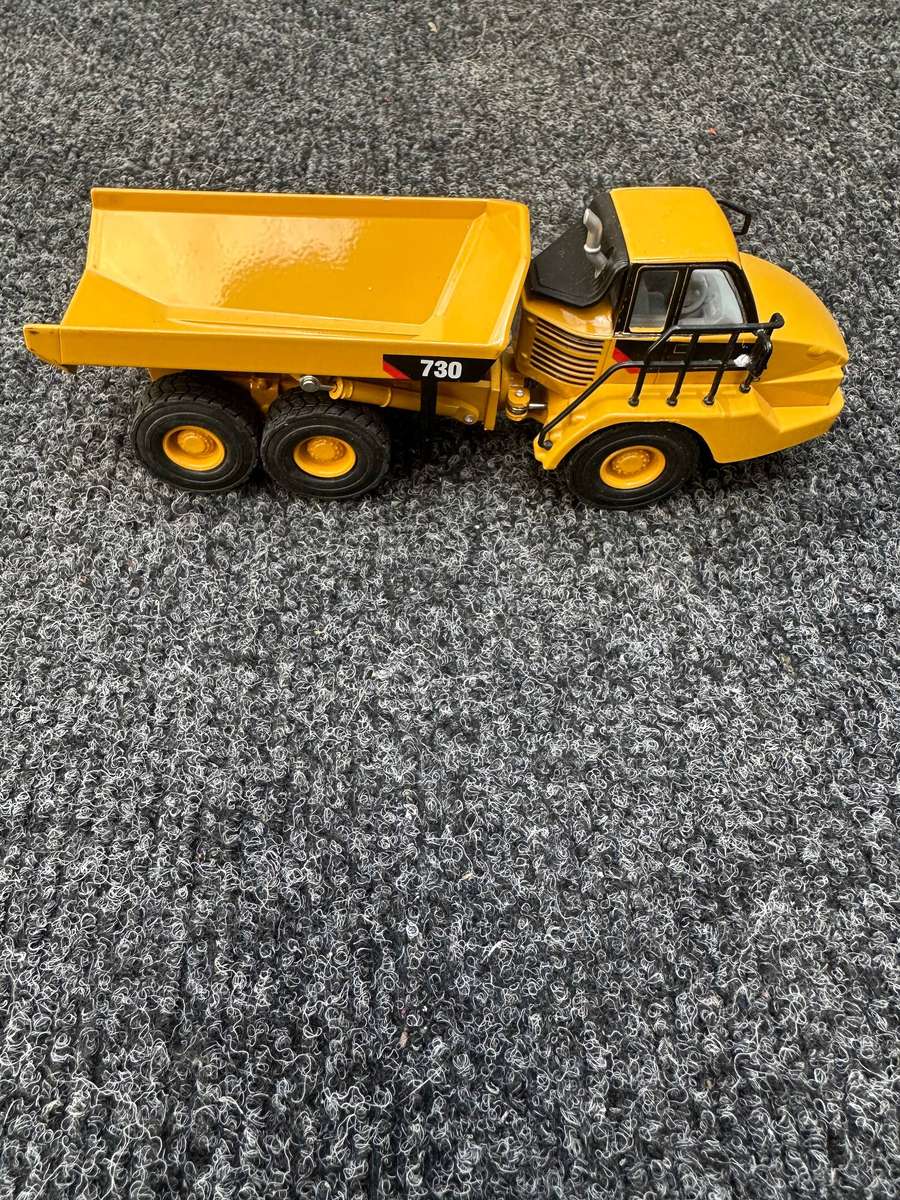 CATERPILLAR ARTICULATED TRUCK
