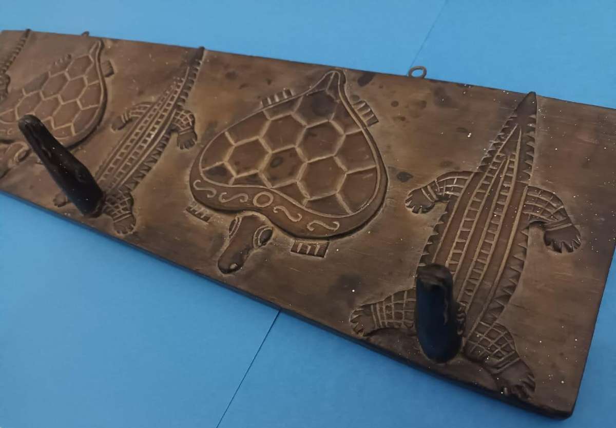 Vintage African carved wooden zoomorphic clothes hanger