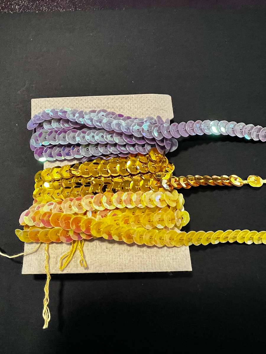 Assorted bundle of trims including sequence and horse hair