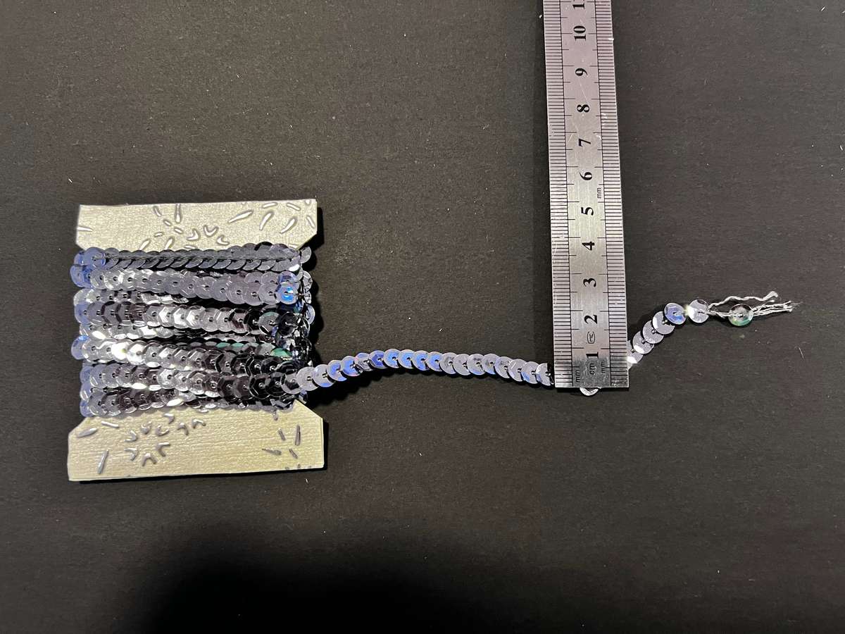 Assorted bundle of trims including sequence and horse hair