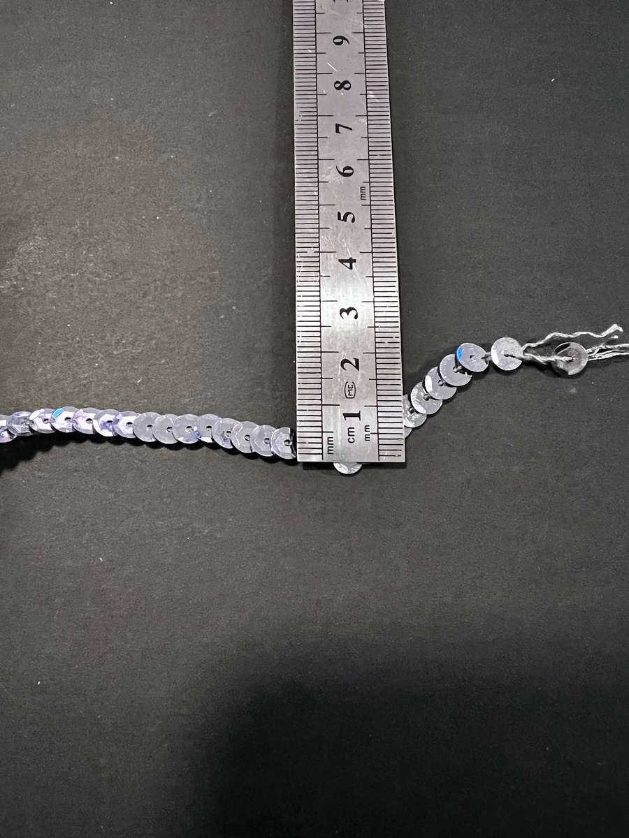 Assorted bundle of trims including sequence and horse hair