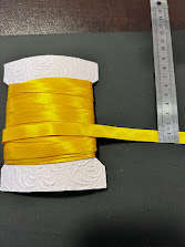 Mixed bundle of yellow bias binding