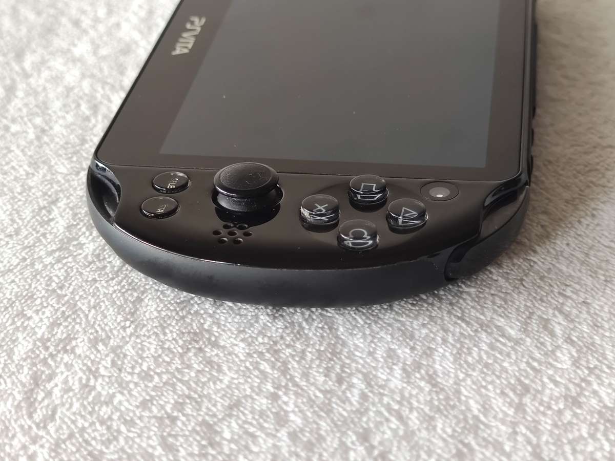 Playstation Vita Slim Console + 3 Games