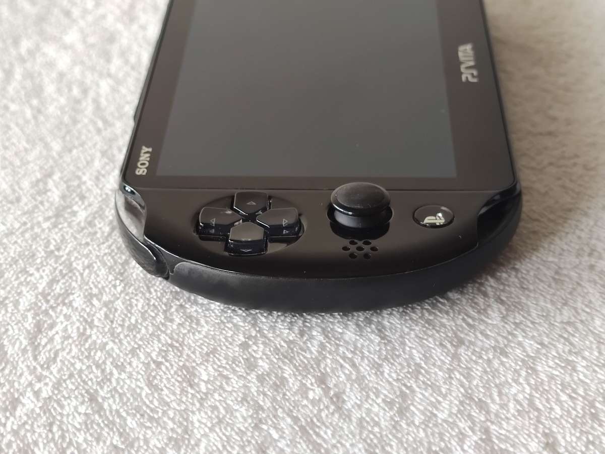 Playstation Vita Slim Console + 3 Games