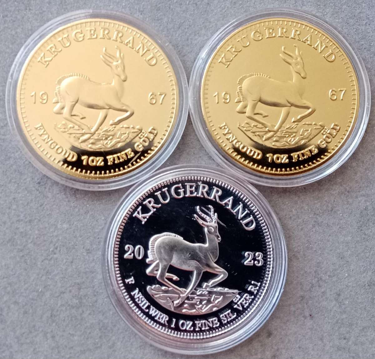 Lot of x3 Krugerrand 1oz replica coins in capsules (x2 gold & 1 silver)