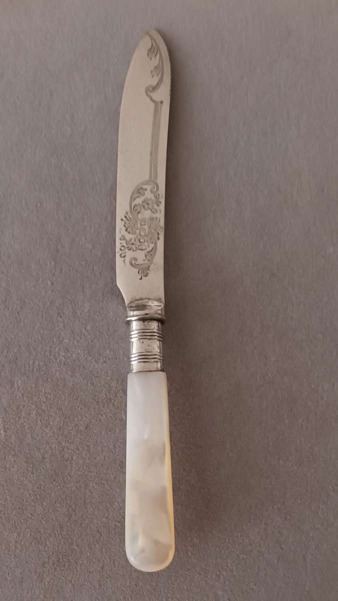 Exquisite Vintage Knife with Mother of Pearl Handle.