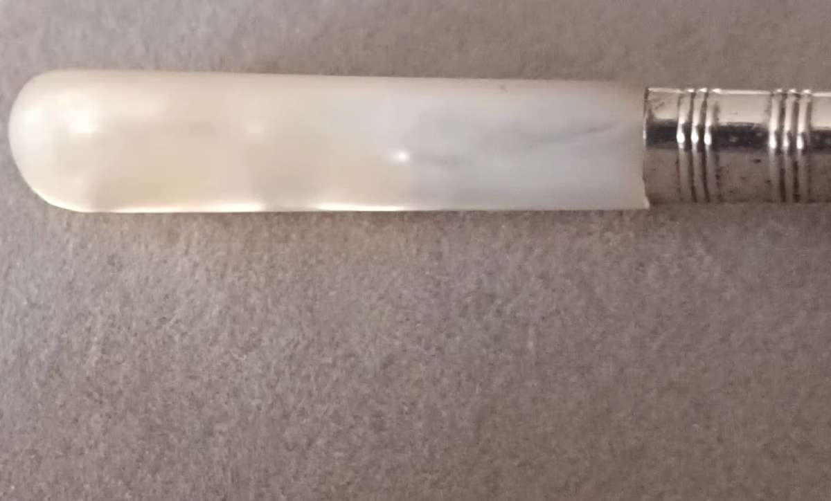 Exquisite Vintage Knife with Mother of Pearl Handle.