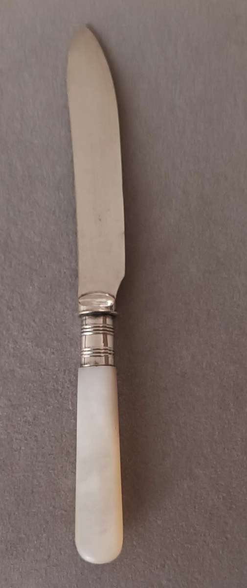 Exquisite Vintage Knife with Mother of Pearl Handle.