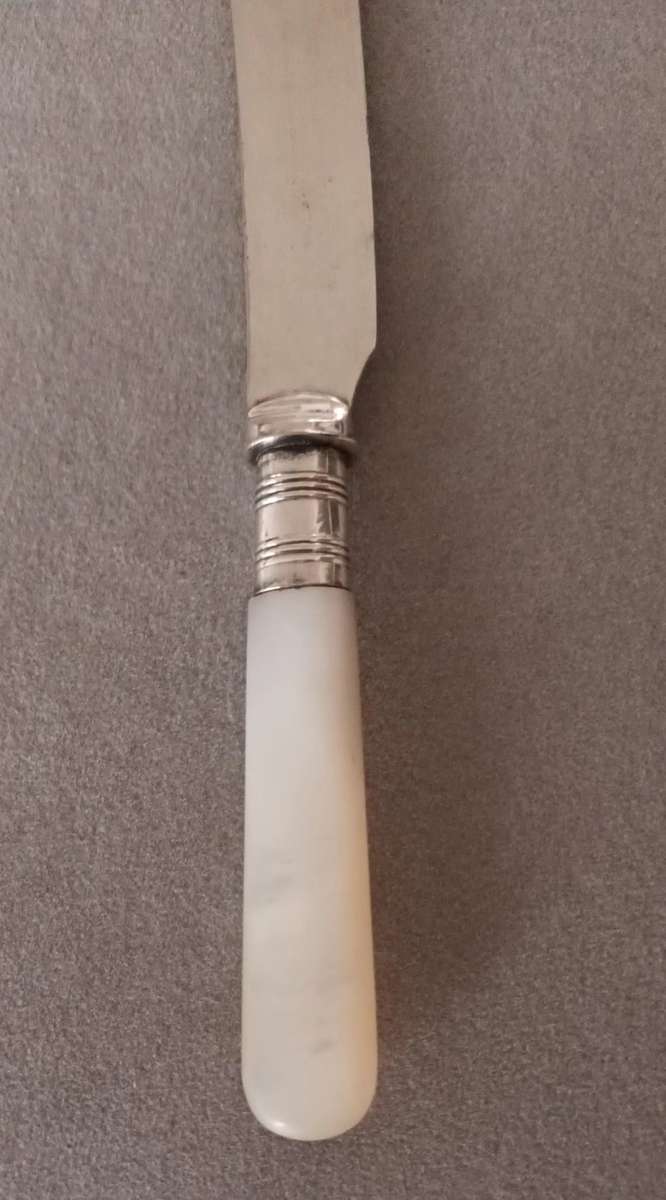 Exquisite Vintage Knife with Mother of Pearl Handle.