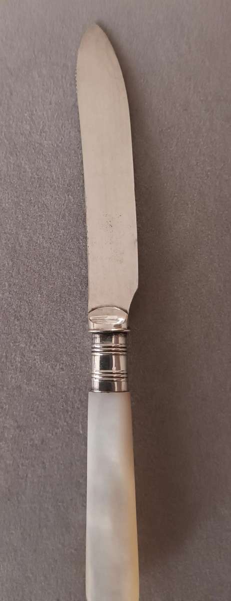 Exquisite Vintage Knife with Mother of Pearl Handle.