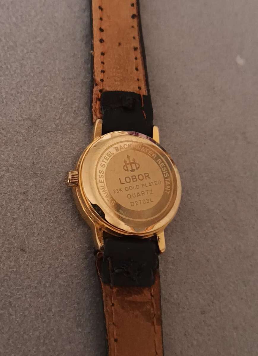 LOBOR COLLECTION QUARTZ WATCH. JAPAN MOVEMENT. 23K GOLD PLATED.