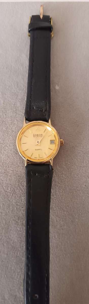 LOBOR COLLECTION QUARTZ WATCH. JAPAN MOVEMENT. 23K GOLD PLATED.