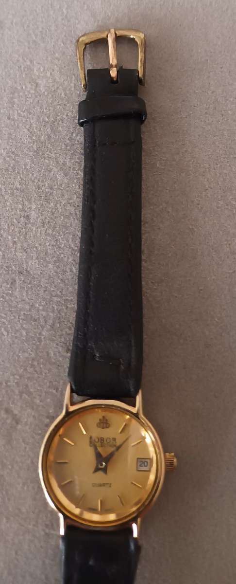 LOBOR COLLECTION QUARTZ WATCH. JAPAN MOVEMENT. 23K GOLD PLATED.