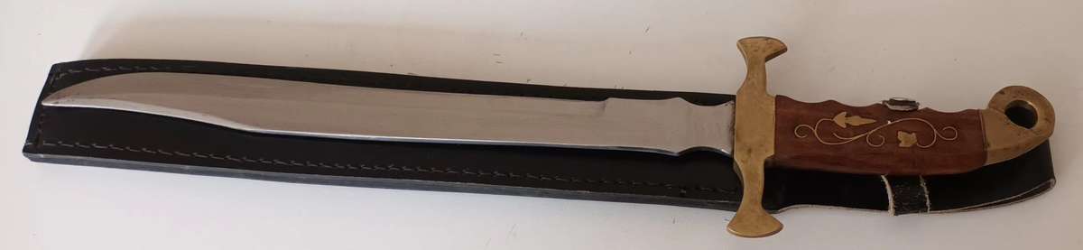 Steel Sword with Wood and Brass Handle.  Genuine Leather Pouch. Length 46cm.