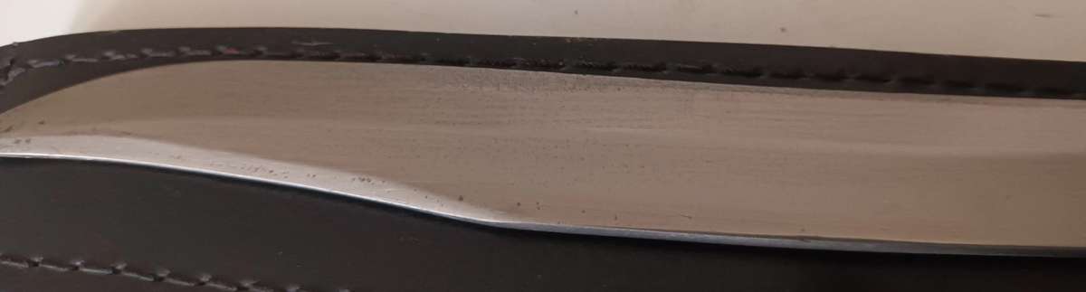 Steel Sword with Wood and Brass Handle.  Genuine Leather Pouch. Length 46cm.