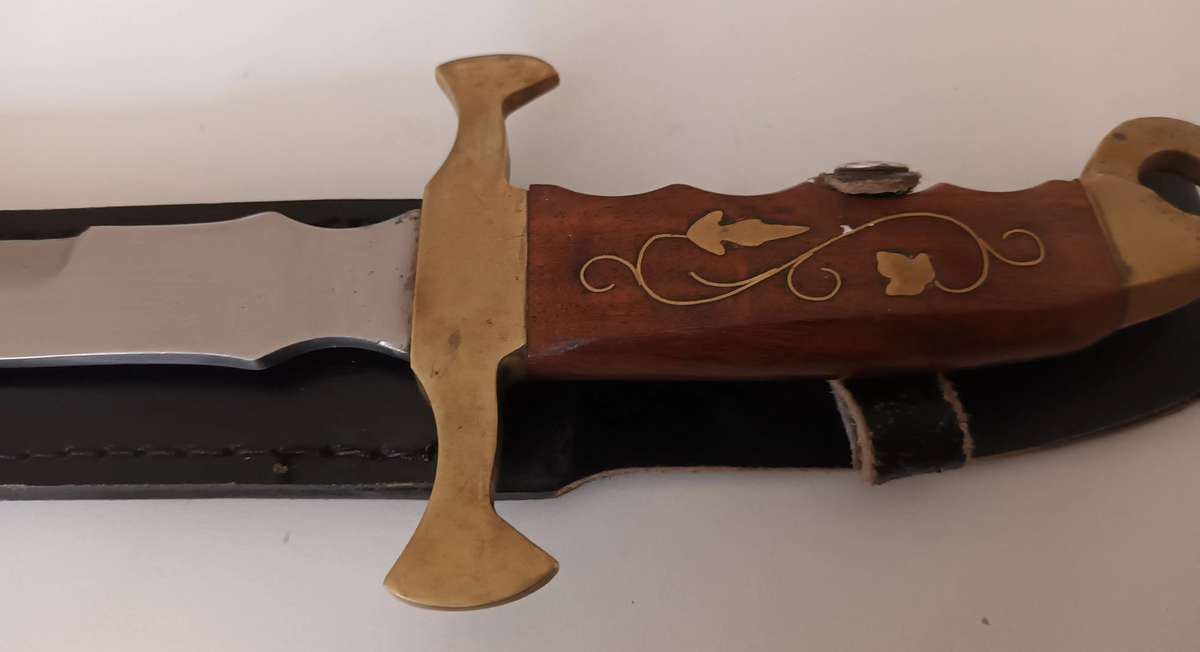 Steel Sword with Wood and Brass Handle.  Genuine Leather Pouch. Length 46cm.