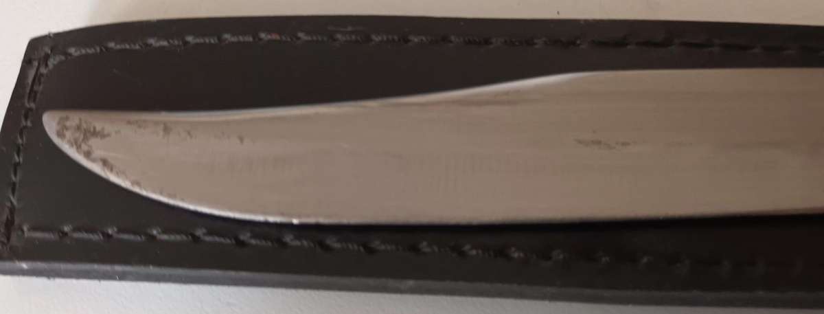 Steel Sword with Wood and Brass Handle.  Genuine Leather Pouch. Length 46cm.