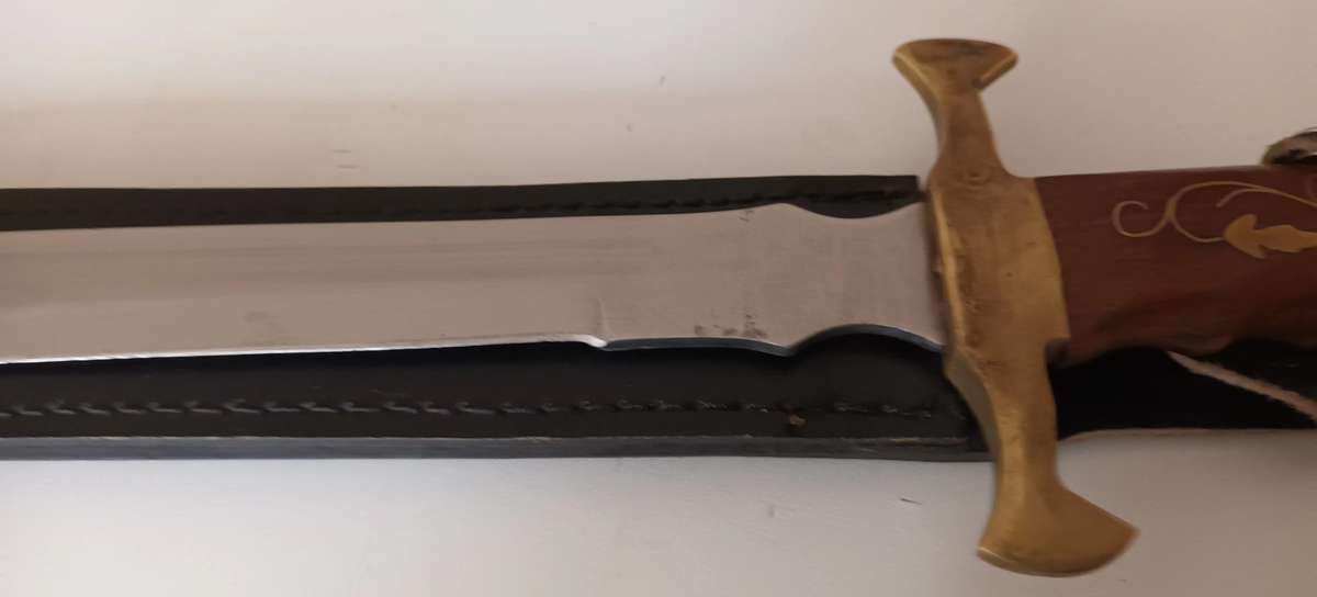 Steel Sword with Wood and Brass Handle.  Genuine Leather Pouch. Length 46cm.