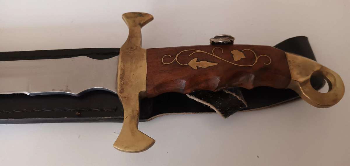 Steel Sword with Wood and Brass Handle.  Genuine Leather Pouch. Length 46cm.