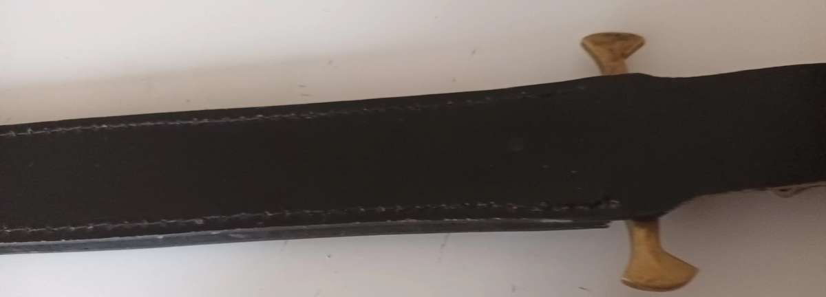Steel Sword with Wood and Brass Handle.  Genuine Leather Pouch. Length 46cm.