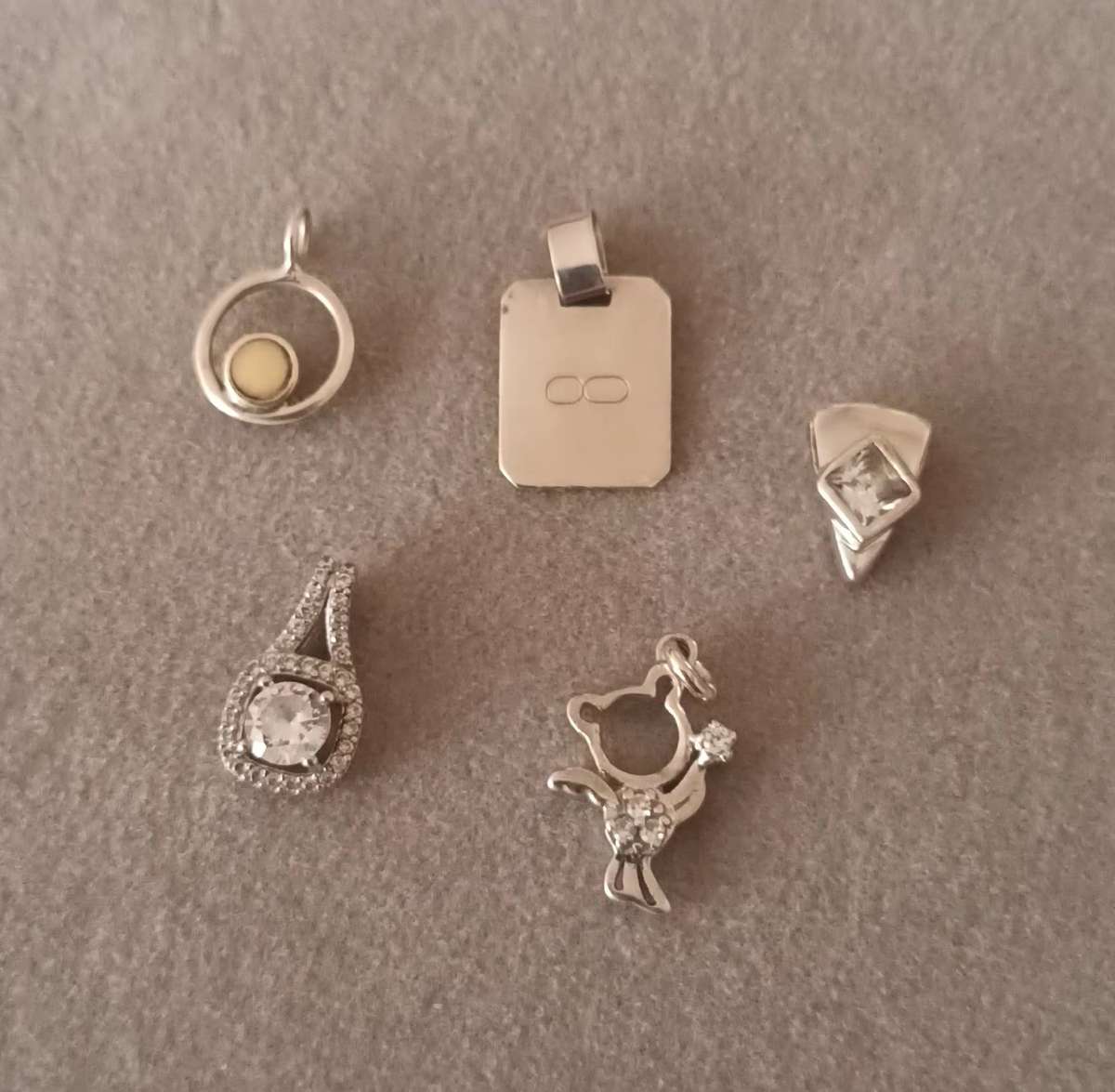 Lot of Sterling Silver Pendants. 4.8g.