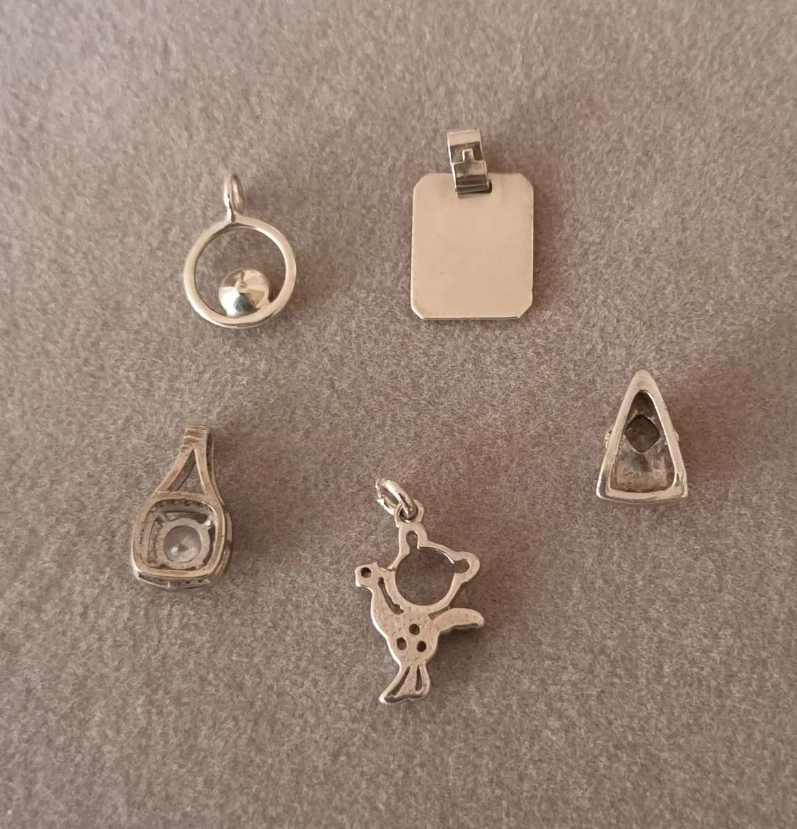 Lot of Sterling Silver Pendants. 4.8g.
