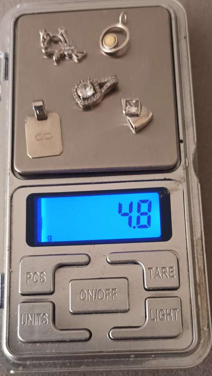 Lot of Sterling Silver Pendants. 4.8g.