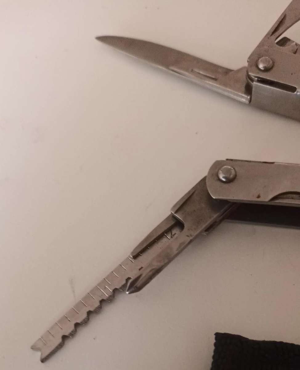 JOHN-BENZEN CHICAGO MULTI-TOOL.