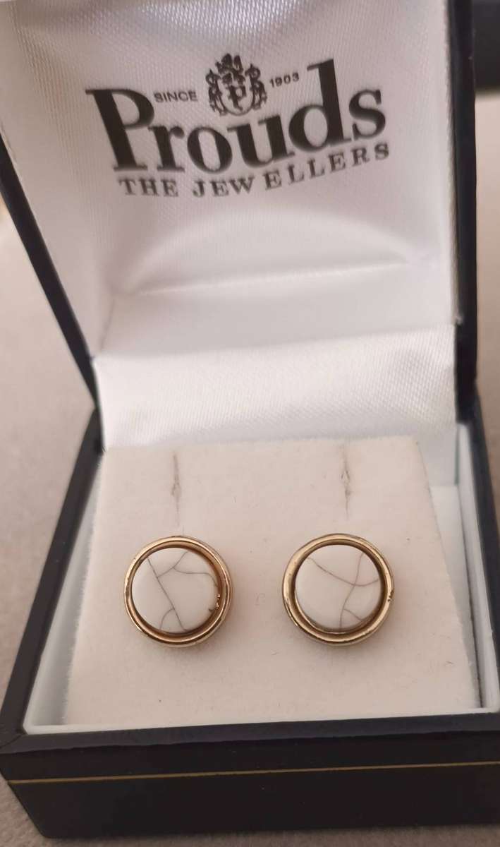 Gold Pated Earrings.