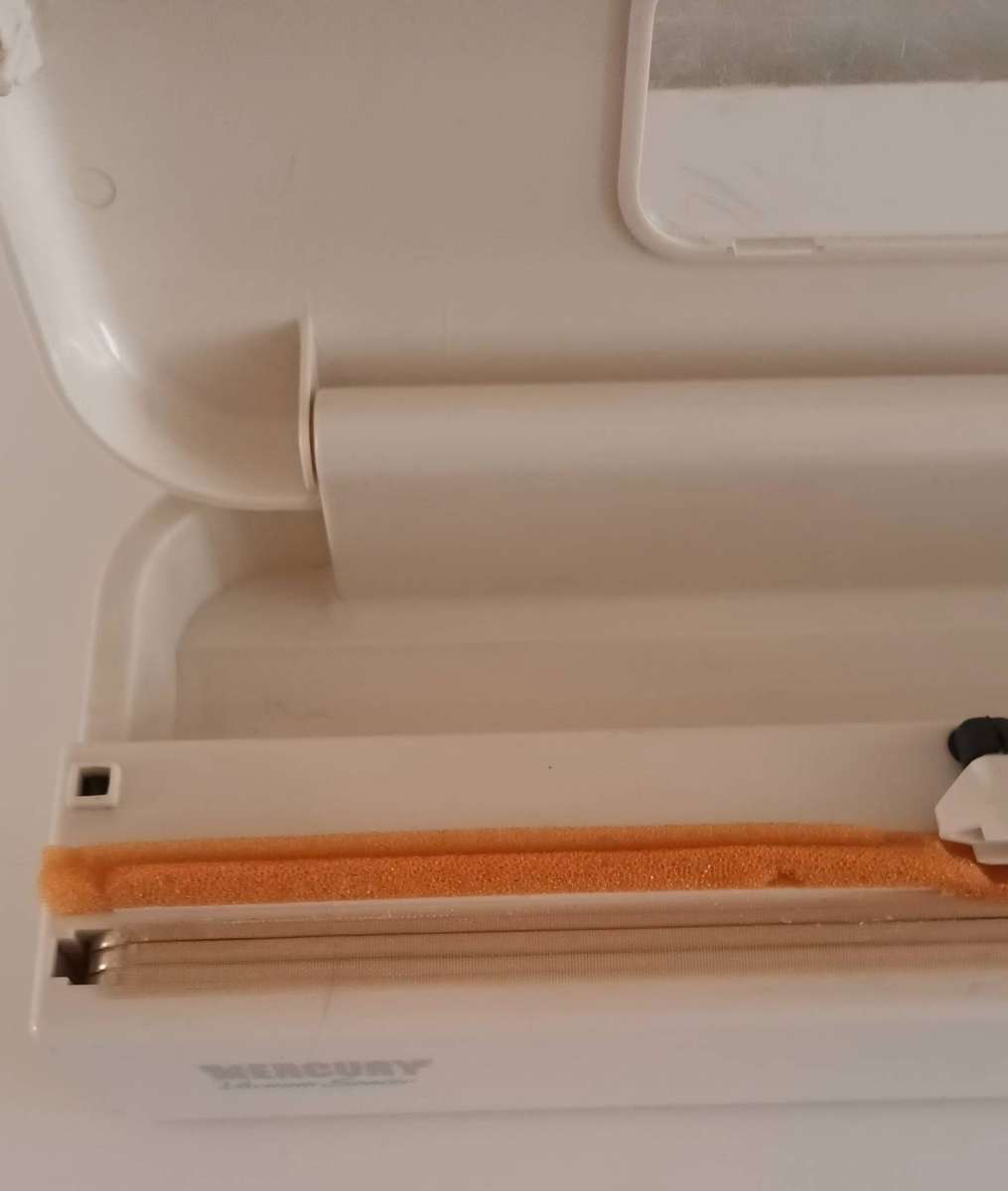 MERCURY VACUUM SEALER.