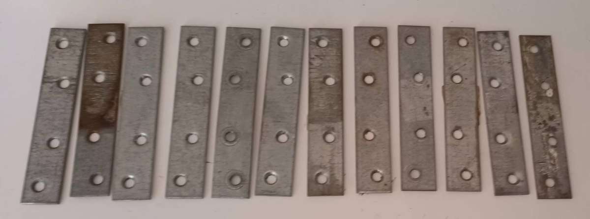 12x Mending Plates. Length 10cm. Width 2cm.