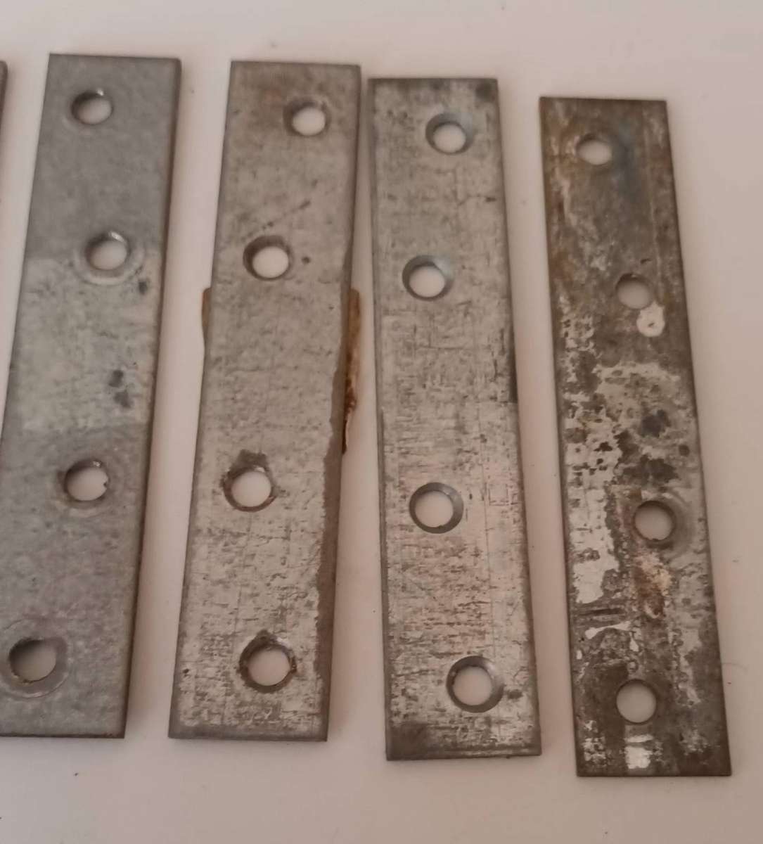 12x Mending Plates. Length 10cm. Width 2cm.