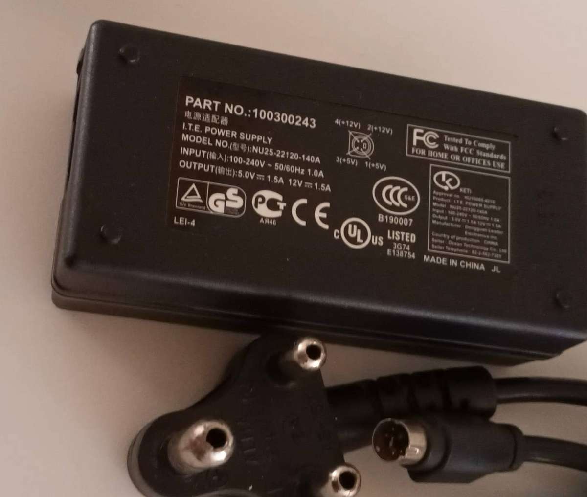 I.T.E - 4 Pin AC/DC adapter that provides a 5V and 12V Output.