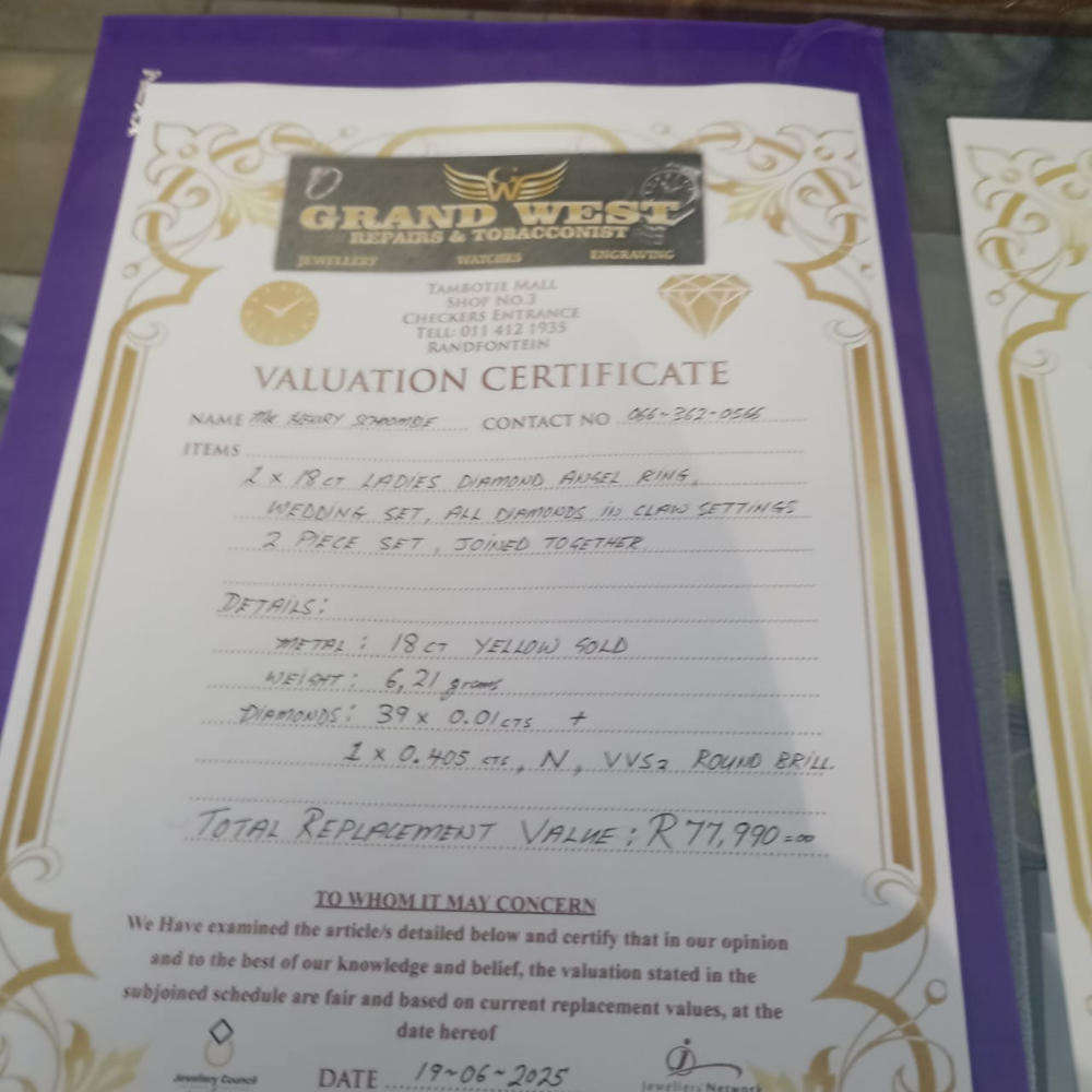 18 carat Angel diamond ring with 9 carat diamond earrings and pendant  rare to find as a set.