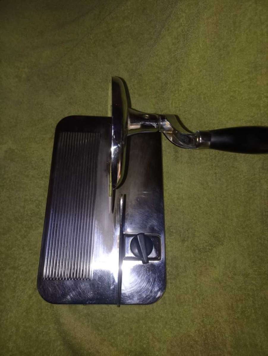 Beautiful Vintage Pineware bread slicer.