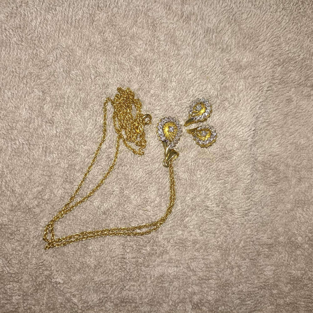 18 carat Angel diamond ring with 9 carat diamond earrings and pendant  rare to find as a set.