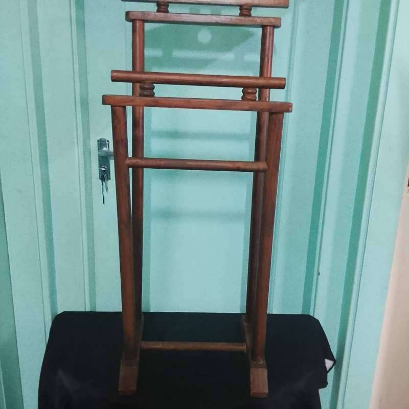 Vintage wooden valet stand also called gentleman's valet or suit stand.