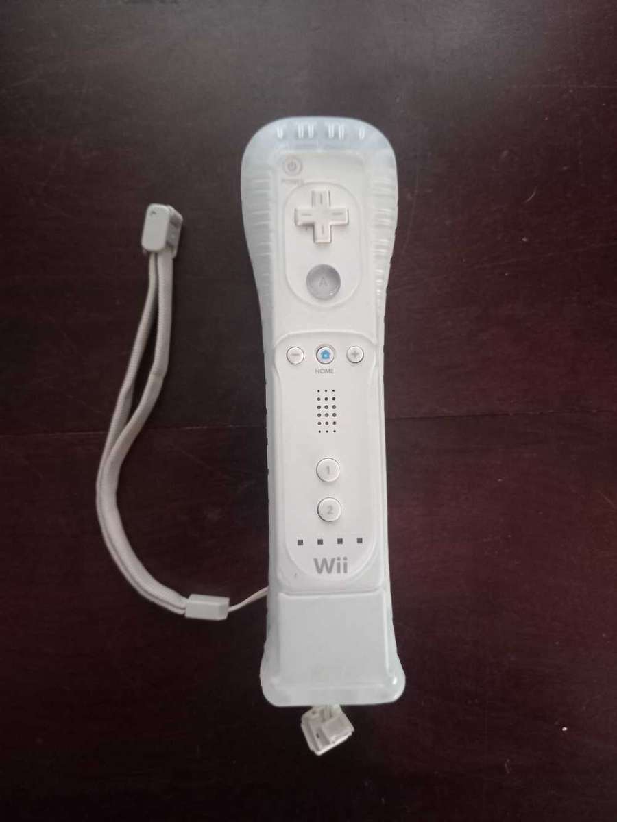 Original Nintendo Wii Remote And Motion Plus Attachment