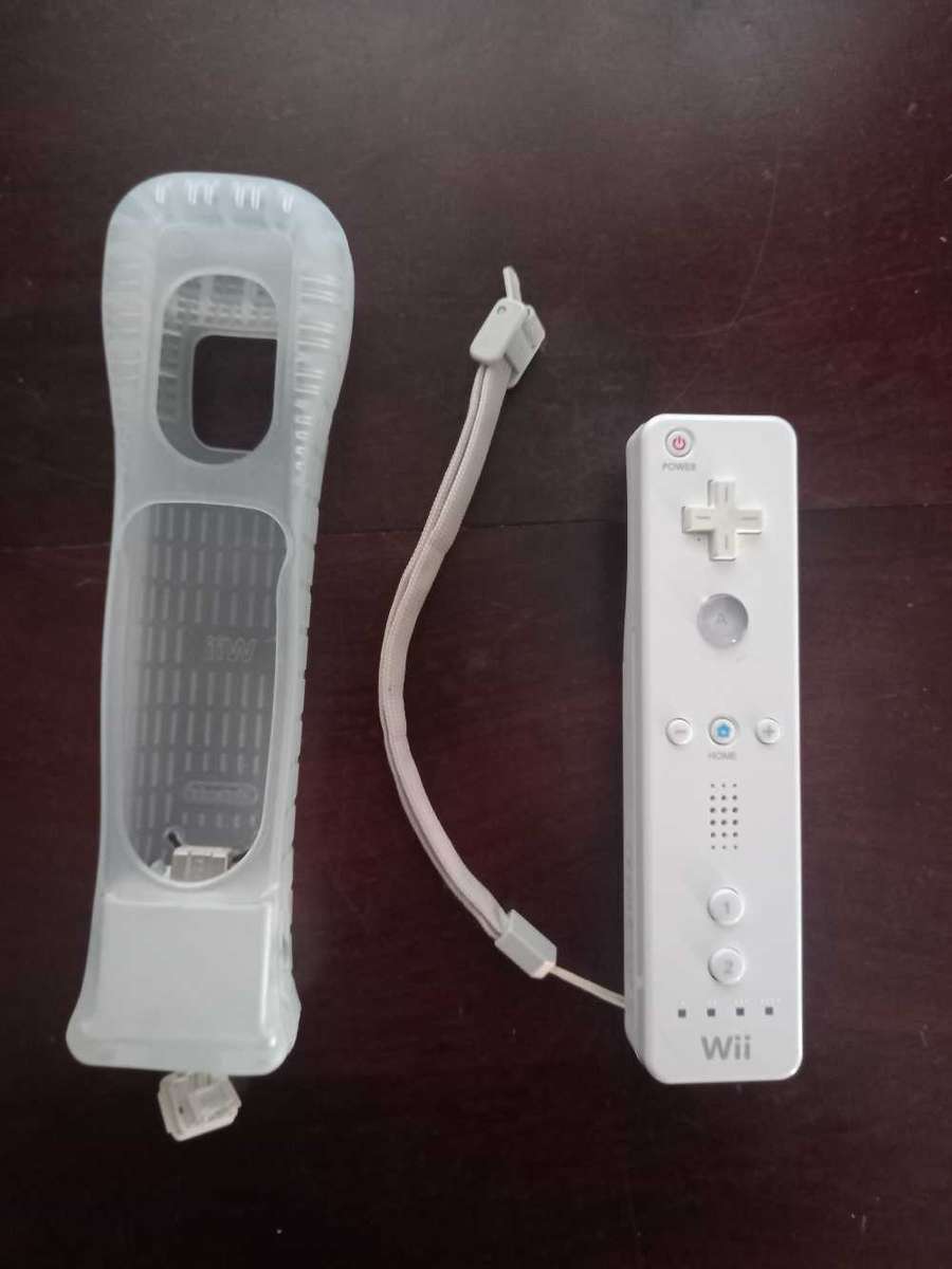 Original Nintendo Wii Remote And Motion Plus Attachment