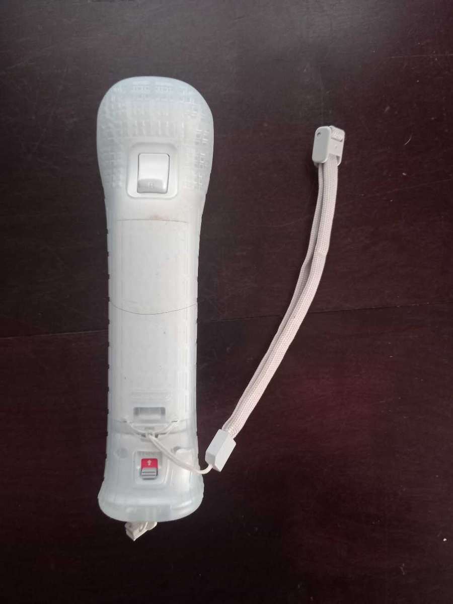 Original Nintendo Wii Remote And Motion Plus Attachment