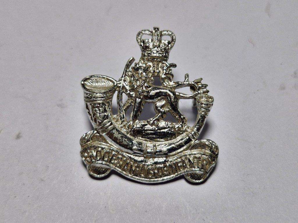 Rhodesian Light Infantry Cap badge. Queen's Crown