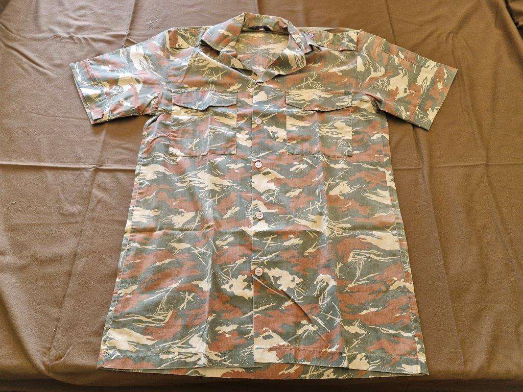 SWAPOL Camo Shirt. 52 CM armpit to armpit. Has tears.