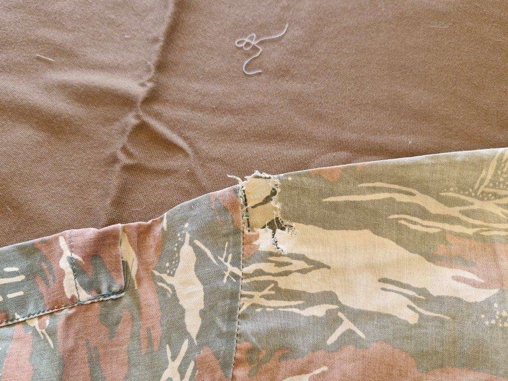 SWAPOL Camo Shirt. 52 CM armpit to armpit. Has tears.