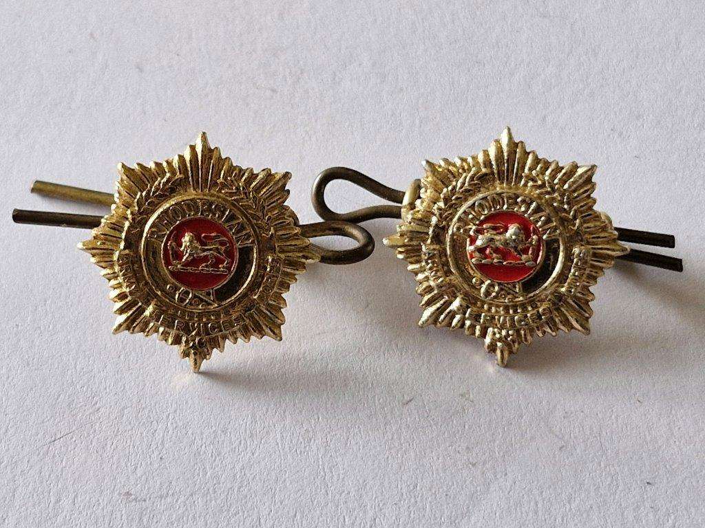 Rhodesian Army Service Corps collar badges. One lug broken.